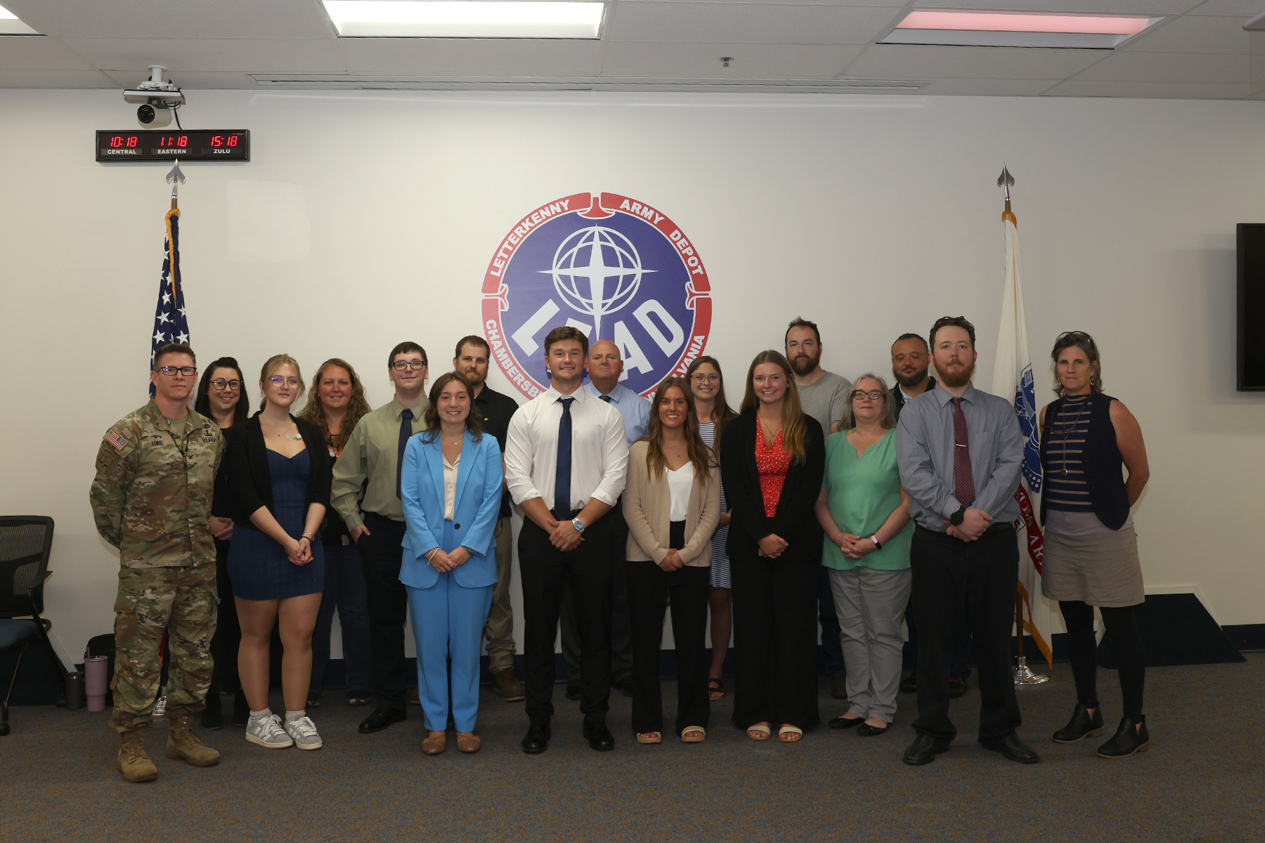 Letterkenny Army Depot interns and a co-op student stand with leadership on Aug. 7, 2025.